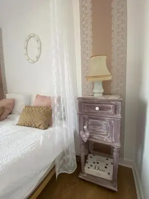 Un ou plusieurs lits dans un hébergement de l'établissement Agréable maison style shabby chic