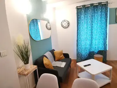 Coin salon dans l'établissement Charmant appartement au coeur de Château-Thierry