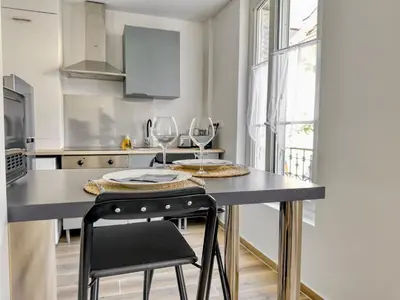 Cuisine ou kitchenette dans l'établissement Le City Chic