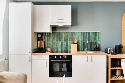 Cuisine ou kitchenette dans l'établissement Cérès - Centre - 3 Chambres