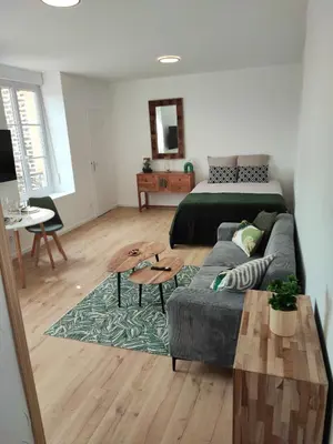 Coin salon dans l'établissement CMG Studio 202 XL Petit Bois Place Ducale