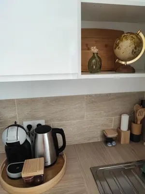 Cuisine ou kitchenette dans l'établissement CMG Studio 202 XL Petit Bois Place Ducale