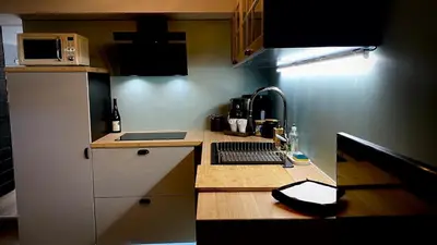 Cuisine ou kitchenette dans l'établissement La Parenthèse