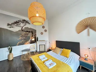 Un ou plusieurs lits dans un hébergement de l'établissement Le cœur de Reims magnifique 3 chambres au centre