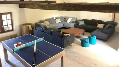 Coin salon dans l'établissement MAISON JV - 24 couchages