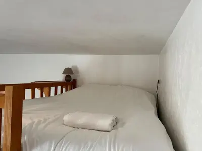 Un ou plusieurs lits dans un hébergement de l'établissement San Francisco, Studio cosy