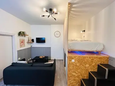Télévision ou salle de divertissement dans l'établissement La Suite Pierret Gare centre