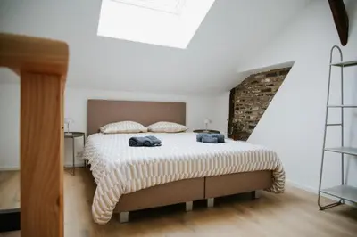 Un ou plusieurs lits dans un hébergement de l'établissement Room Urban Chic