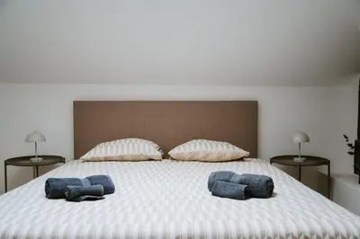 Un ou plusieurs lits dans un hébergement de l'établissement Room Urban Chic