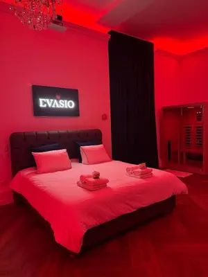 Un ou plusieurs lits dans un hébergement de l'établissement Suite EVASIO, au pied du château fort, parking privé
