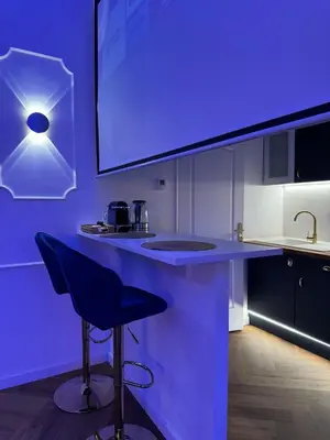 Cuisine ou kitchenette dans l'établissement Suite EVASIO, au pied du château fort, parking privé