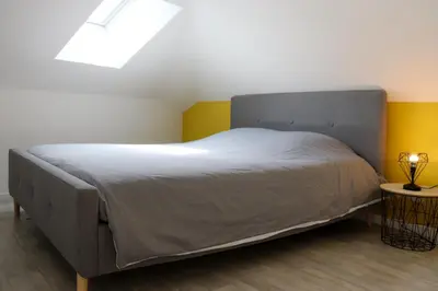 Un ou plusieurs lits dans un hébergement de l'établissement Appartement 2 chambres