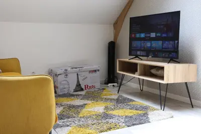 Télévision ou salle de divertissement dans l'établissement Appartement 2 chambres