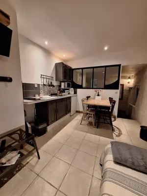 Cuisine ou kitchenette dans l'établissement Gîte et chevaux