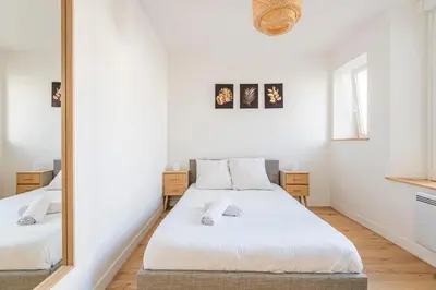 Un ou plusieurs lits dans un hébergement de l'établissement Moderne appartement 4 pers
