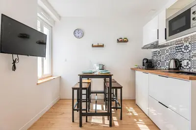 Cuisine ou kitchenette dans l'établissement Moderne appartement 4 pers