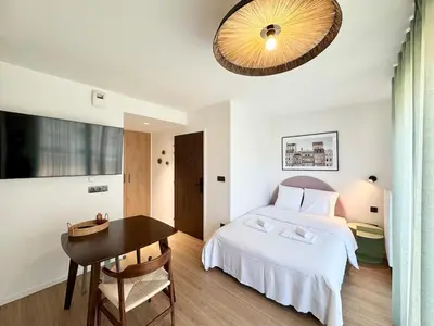 Un ou plusieurs lits dans un hébergement de l'établissement We Live Inn Sharies Reims - C202