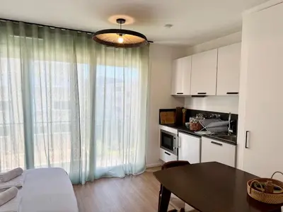 Cuisine ou kitchenette dans l'établissement We Live Inn Sharies Reims - C202