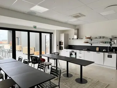 Cuisine ou kitchenette dans l'établissement We Live Inn Sharies Reims - C203