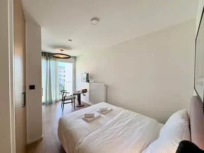 Un ou plusieurs lits dans un hébergement de l'établissement We Live Inn Sharies Reims - C403