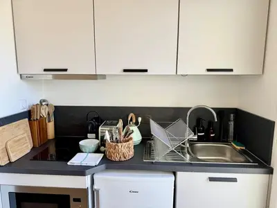 Cuisine ou kitchenette dans l'établissement We Live Inn Sharies Reims - C403