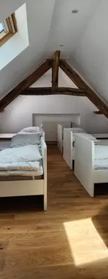 Un ou plusieurs lits dans un hébergement de l'établissement Gite Saint Martin du Boschet, 1h15 de Paris