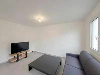 Télévision ou salle de divertissement dans l'établissement Sofia - grand appartement convivial