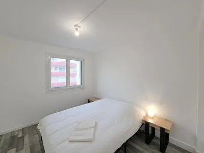 Un ou plusieurs lits dans un hébergement de l'établissement Sofia - grand appartement convivial