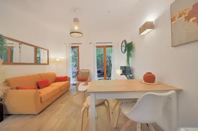 Coin salon dans l'établissement Les Charmes C24B - Le Val Joly