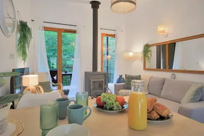 Coin salon dans l'établissement Les Charmes C24A - Le Val Joly