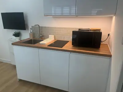 Cuisine ou kitchenette dans l'établissement Mallorca, plein centre avec parking