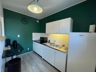 Cuisine ou kitchenette dans l'établissement Le logis de Mel HYPER CENTRE VILLE ÉPERNAY