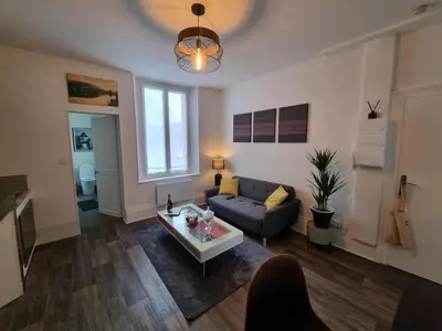 Coin salon dans l'établissement Appartement cosy