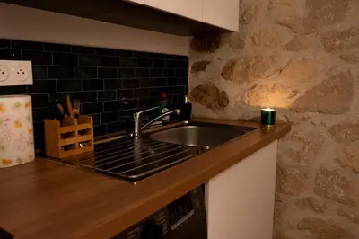 Cuisine ou kitchenette dans l'établissement L'Exceptionnel