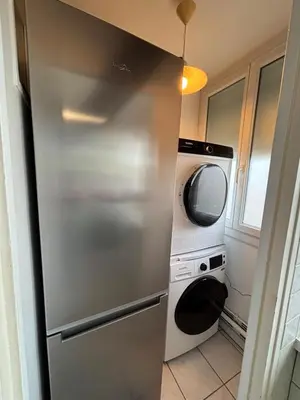 Cuisine ou kitchenette dans l'établissement City break Reims - Grand balcon