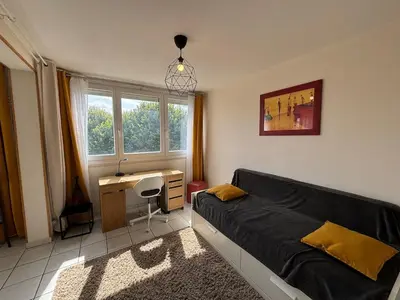 Coin salon dans l'établissement City break Reims - Grand balcon