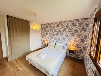 Un ou plusieurs lits dans un hébergement de l'établissement La Maison Salzbourg 8 personnes Paisible