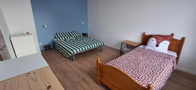 Un ou plusieurs lits dans un hébergement de l'établissement Hébergement 5 personnes- Centre village