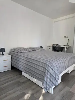 Un ou plusieurs lits dans un hébergement de l'établissement appartement Sedan, France