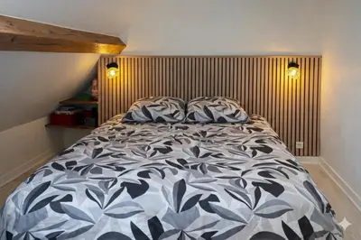 Un ou plusieurs lits dans un hébergement de l'établissement Cosy Garden DisneyLand
