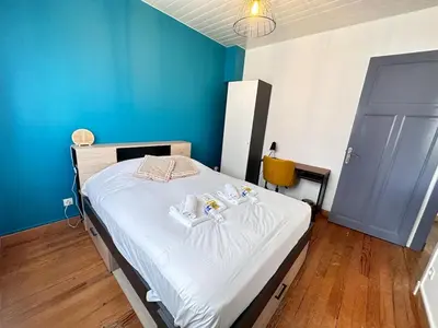 Un ou plusieurs lits dans un hébergement de l'établissement La maison champenoise 4 chambres avec terrasse