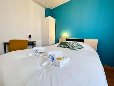 Un ou plusieurs lits dans un hébergement de l'établissement La maison champenoise 4 chambres avec terrasse