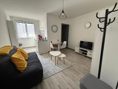 Télévision ou salle de divertissement dans l'établissement Le Wabaki