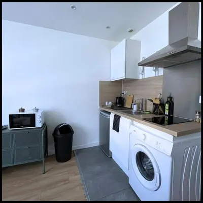 Cuisine ou kitchenette dans l'établissement SQ'Appart One - 1 Chambre - Proche Gare