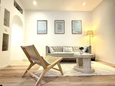 Coin salon dans l'établissement E Petit Prince T3 avec SPA & Lit King size