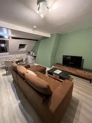 Télévision ou salle de divertissement dans l'établissement Cocon Bourbon