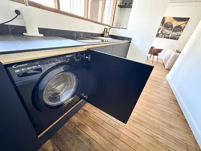 Cuisine ou kitchenette dans l'établissement Uniq'Home Luxe Design et Sauna Centre Historique