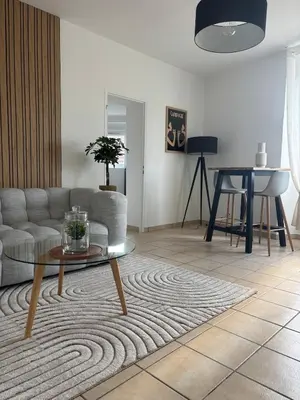 Coin salon dans l'établissement L'Escapade