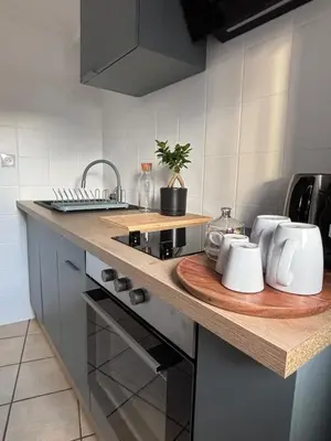 Cuisine ou kitchenette dans l'établissement L'Escapade