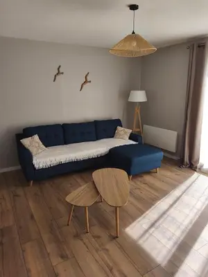 Coin salon dans l'établissement Gîte du Bois